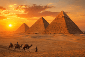 he Pyramids of Giza illuminated by the Egyptian sunset